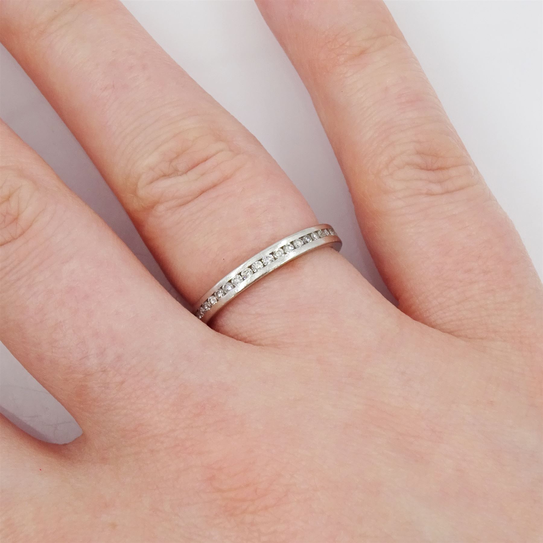 Platinum channel set round brilliant cut diamond full eternity ring - Image 2 of 4