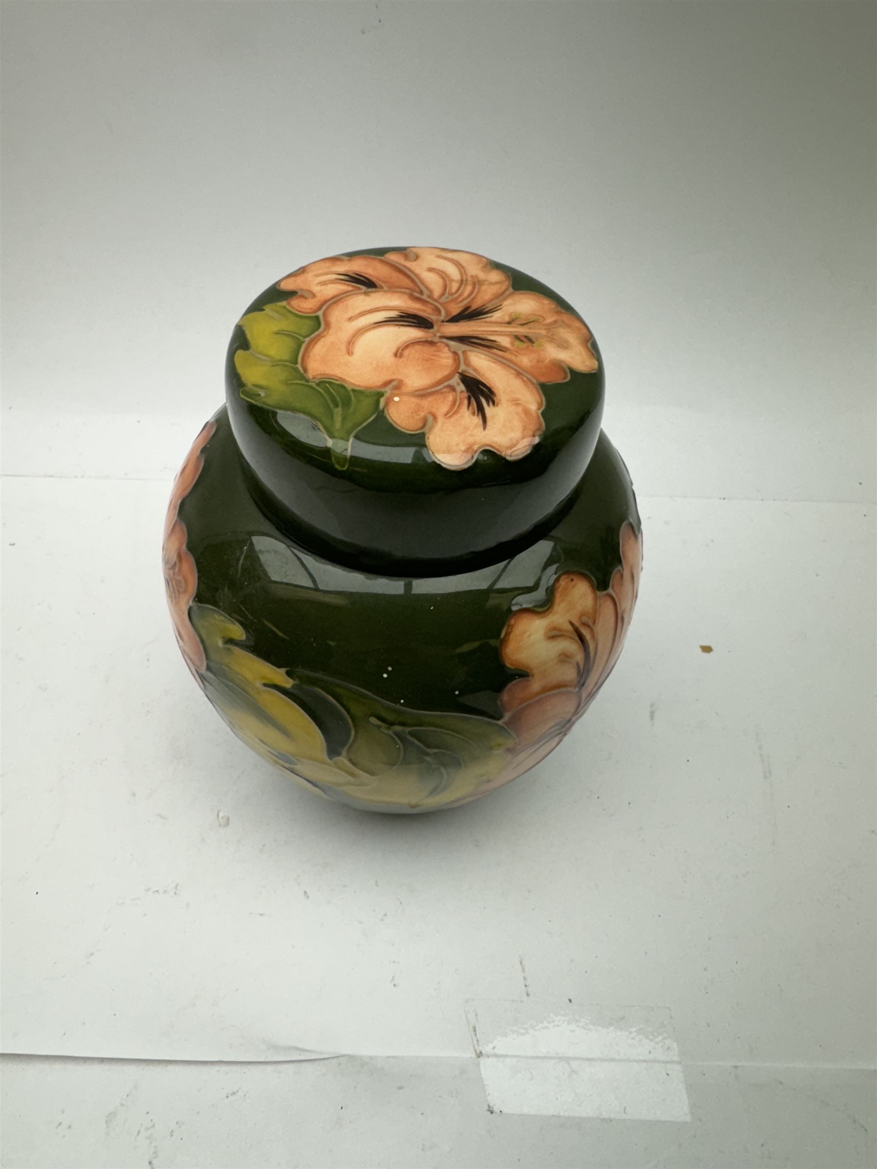 Moorcroft ginger jar in Hibiscus pattern on green ground - Image 2 of 6