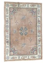 Chinese washed woollen pink ground rug