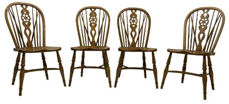 Set of four elm Windsor dining chairs