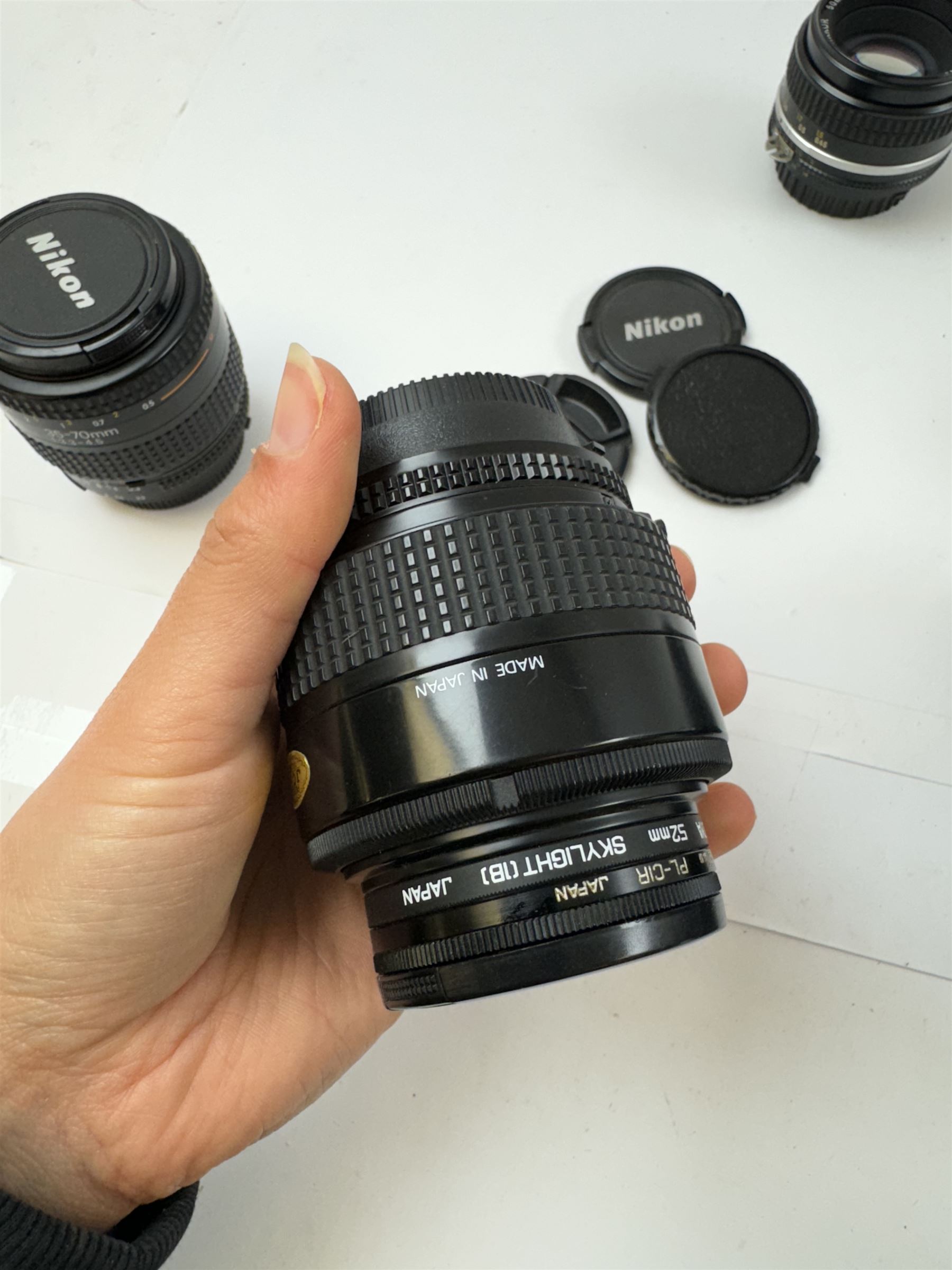 Eleven Nikon camera lenses - Image 16 of 17