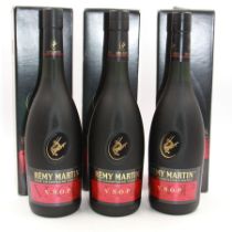 Three bottles Remy Martin V.S.O.P champagne cognac