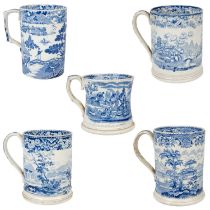 Four blue and white printed porter mugs.