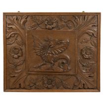 A rectangular carved walnut panel.