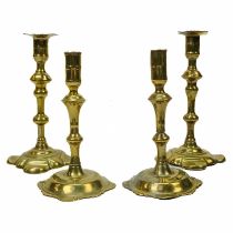 A pair of 18th century brass candlesticks by I Ward & Son.
