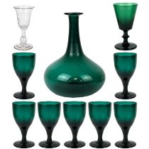 A George III green glass onion shape decanter.