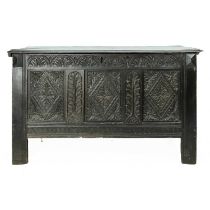 A 17th century panelled oak coffer.