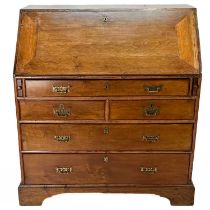 A George III elm and fruitwood bureau.