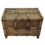 A Continental iron bound panelled elm chest,