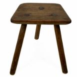An ash three legged stool