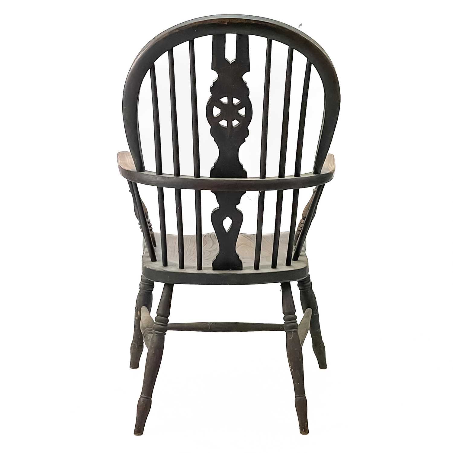 A Victorian ash and elm wheelback Windsor armchair. - Image 3 of 5