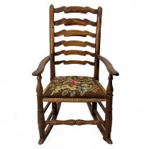 An ash ladder back rocking chair.