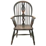 A Victorian ash and elm wheelback Windsor armchair.
