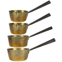 A Set of four late Victorian graduated brass saucepans.