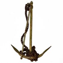 A wrought iron ships anchor.