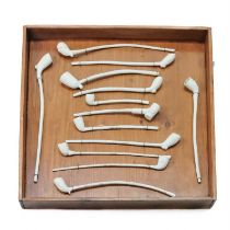 A collection of 13 Churchwarden's clay pipes.