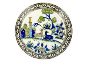 A Persian pottery dish, 19th century,