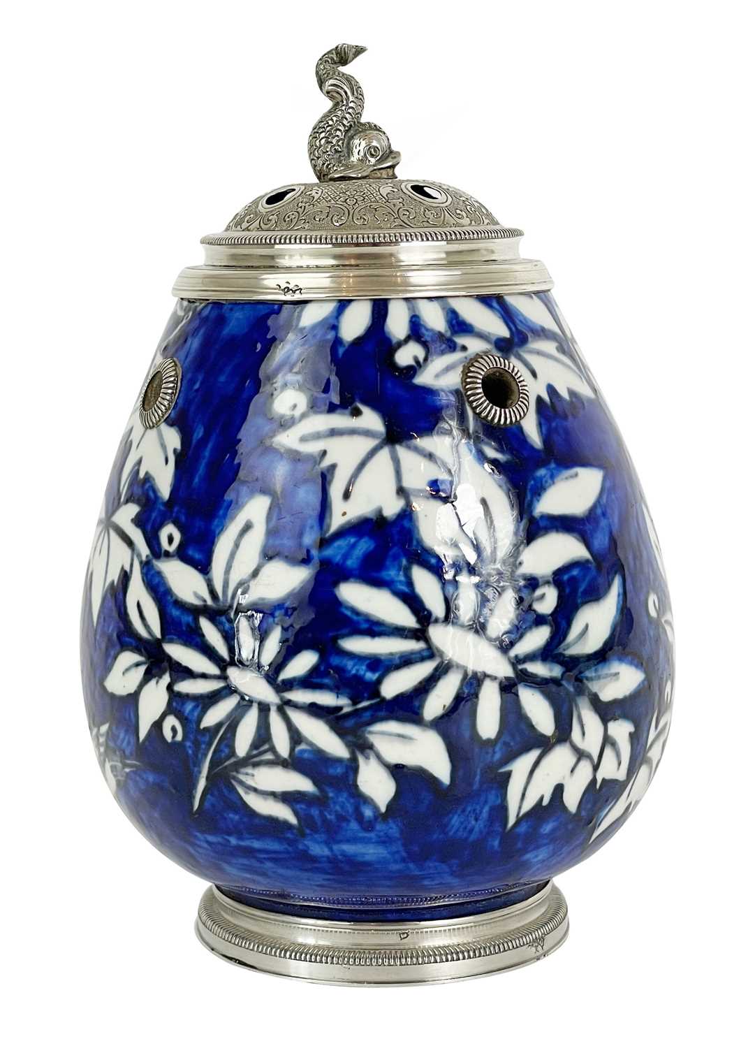 A Persian pottery and silver mounted pot, early 20th century.