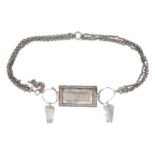 An Omani silver rectangular amulet with chain.