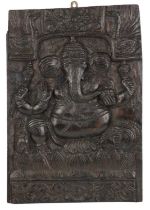 An Indian carved hardwood panel, 19th century.