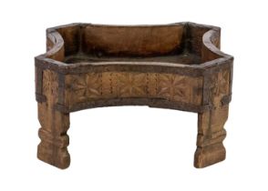 An Indian carved wood planter / rice stand, early 20th century.