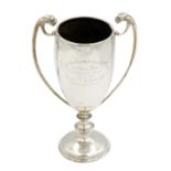 A silver trophy cup inscribed 'Rangoon Paperchase Club, 1916'.