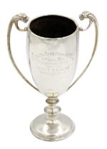 A silver trophy cup inscribed 'Rangoon Paperchase Club, 1916'.