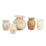 Five Egyptian archaic style alabaster pots and vases.