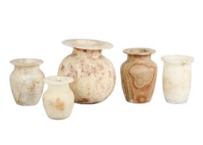 Five Egyptian archaic style alabaster pots and vases.