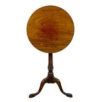 A George III mahogany circular tilt top occasional table.