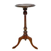 A George III style mahogany candle stand.