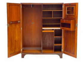 A Gentleman's mahogany Compactum wardrobe.