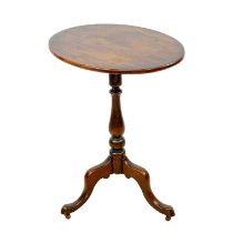 A Victorian oval mahogany wine table.