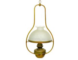 A brass and copper hanging oil lamp.
