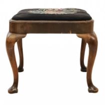 A George II walnut stool.