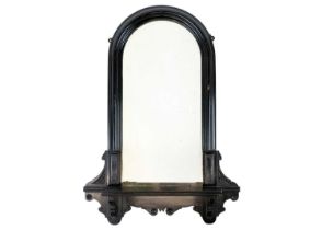 A small Victorian Aesthetic movement ebonised arched mirror.