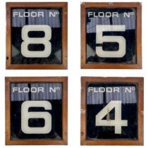 Four mid 20th century teak frame lift floor signs.
