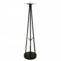 An ecclesiastical floor standing iron candle holder.