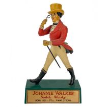 A Johnnie Walker counter top advertising figure.