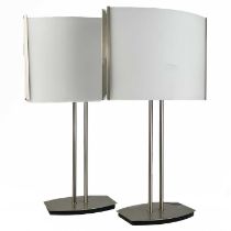 A pair of chrome and glass contemporary table lamps.