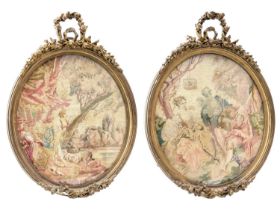 A pair of 20th century embroidered panels of bucolic scenes.