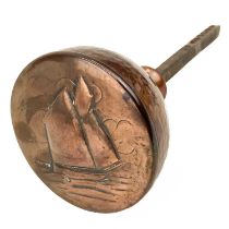 A Newlyn copper door handle.