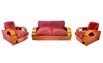 An Art Deco walnut veneer upholstered three piece suite.