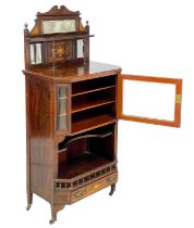 An Edwardian rosewood inlaid music cabinet.