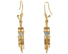 A 14ct and aquamarine set pair of Modernist pendant earrings.