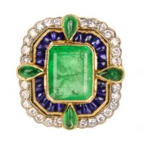 An attractive 18ct diamond, emerald and sapphire set dress ring.