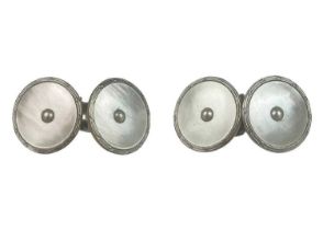 A pair of 18ct and platinum mother-of-pearl and seed pearl cufflinks.