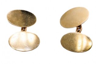 A 9ct pair of plain oval cuff links by Walker & Hall.