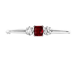 An attractive 1.98ct certified diamond and synthetic ruby set three-stone platinum bar brooch.