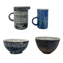 Four glazed Troika pottery items.